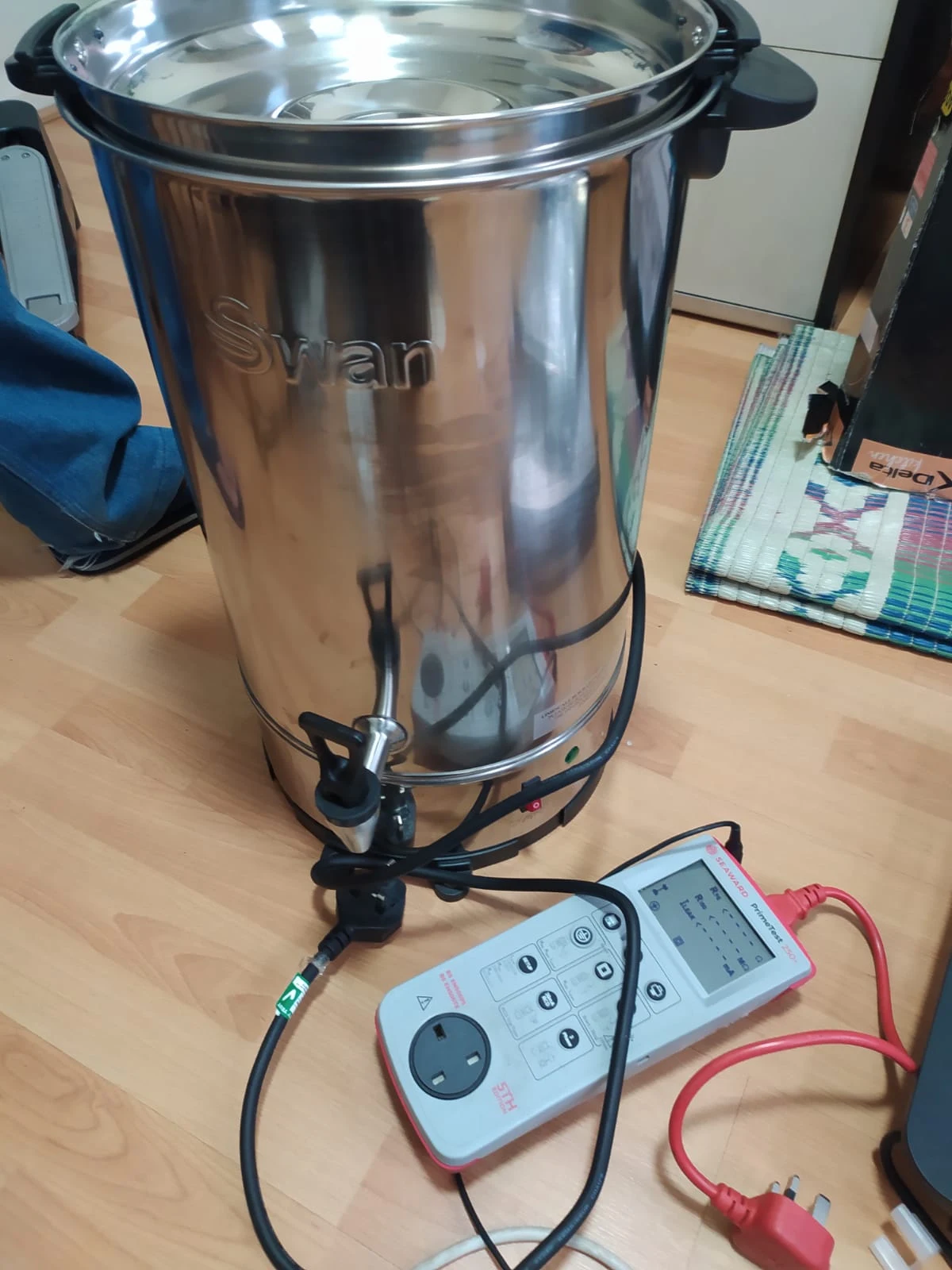 SparkSafe PAT testing a Swan catering water boiler with a Seaward PrimeTest calibrated tester